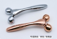 silver and rose gold 3D roller face-lifting instrument