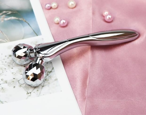 silver and rose gold 3D roller face-lifting instrument